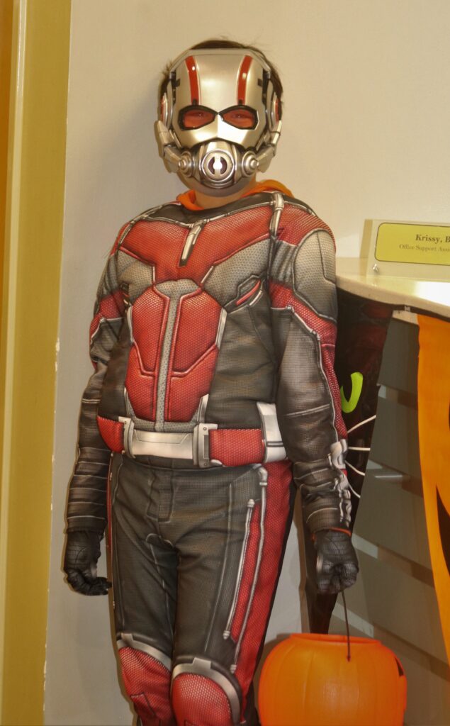 child in ant man costume