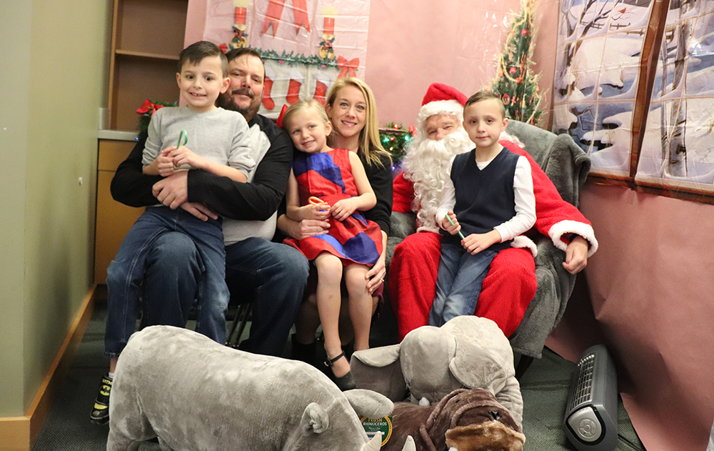 A family visits with santa
